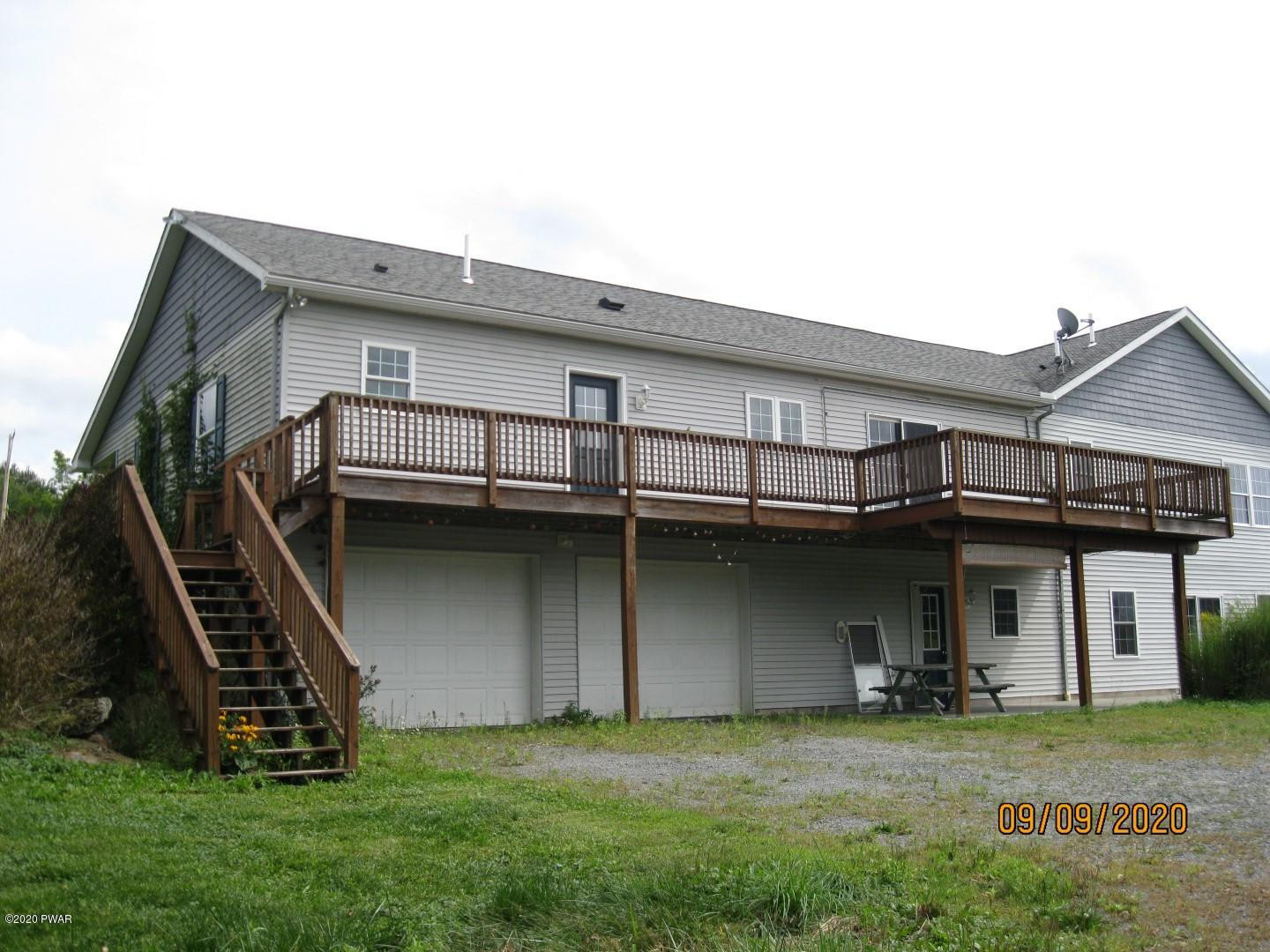 271 North Baker Road Waymart, PA 18472 - Photo 7 of 25 a view of a house with a yard