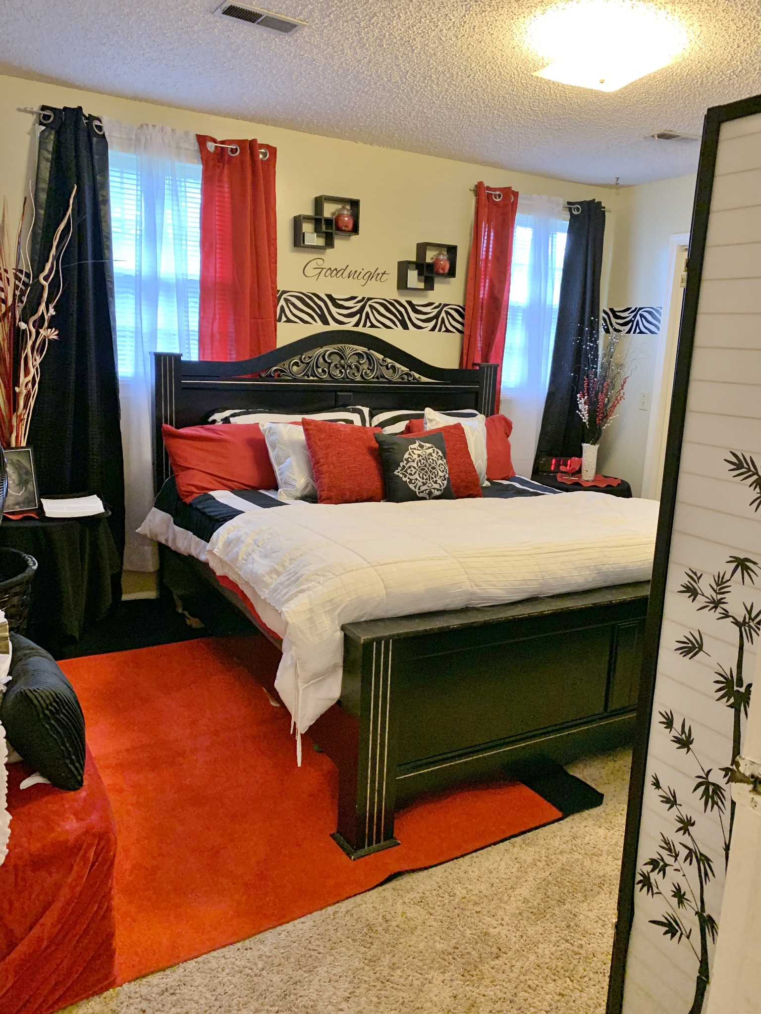 3060 Anderson Road Nashville, TN 37217 - Photo 23 of 43 a bed sitting in a bedroom next to a window