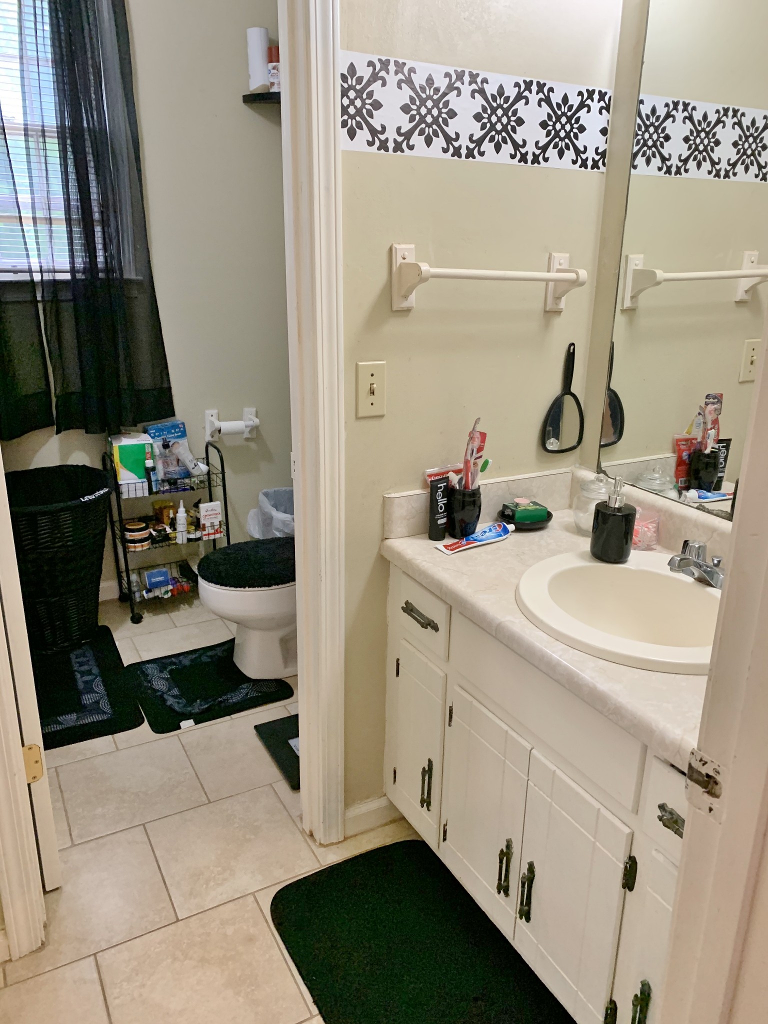 3060 Anderson Road Nashville, TN 37217 - Photo 28 of 43 a bathroom with a sink and a mirror