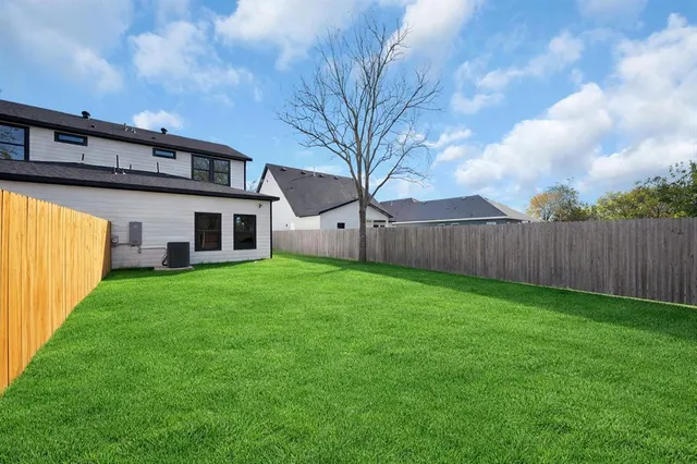 a view of a backyard with a garden