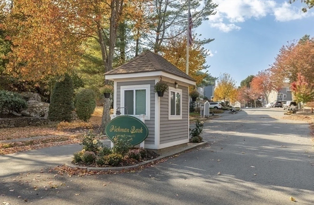 1 Spruance Way, Unit D Salem, MA 01970 - Photo 21 of 22 a front view of a house with a yard