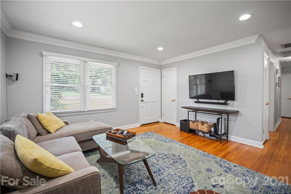 3854 Litchfield Road Charlotte, NC 28211 - Photo 2 of 35 a living room with furniture and a flat screen tv