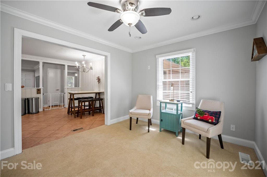 3854 Litchfield Road Charlotte, NC 28211 - Photo 11 of 35 a living room with furniture and a window
