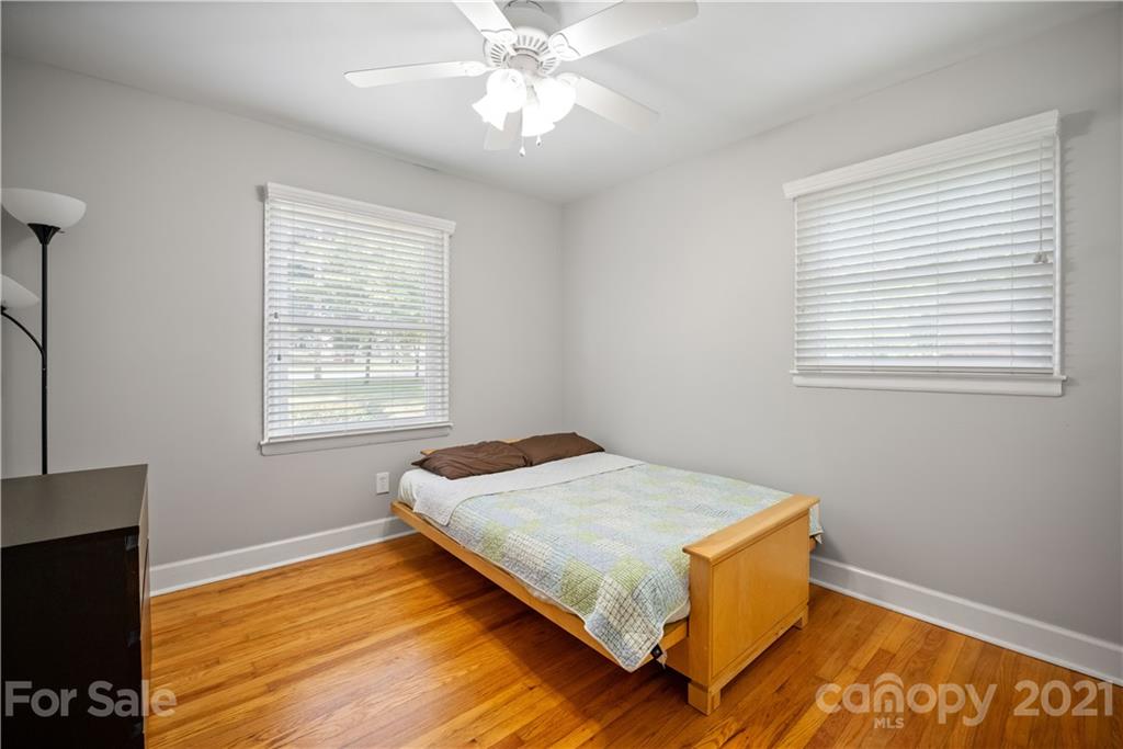 3854 Litchfield Road Charlotte, NC 28211 - Photo 17 of 35 a bedroom with a bed and a window