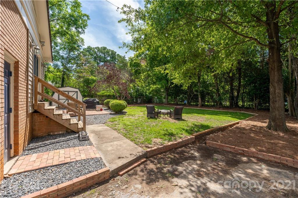 3854 Litchfield Road Charlotte, NC 28211 - Photo 18 of 35 a view of a backyard with sitting area