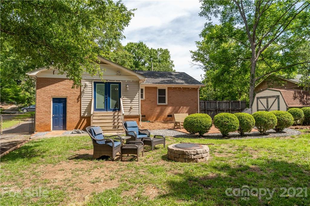 3854 Litchfield Road Charlotte, NC 28211 - Photo 21 of 35 a view of a house with backyard and sitting area