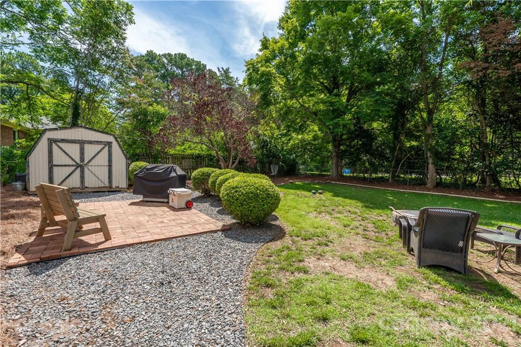 3854 Litchfield Road Charlotte, NC 28211 - Photo 27 of 35 a view of a two chairs and a table in the patio