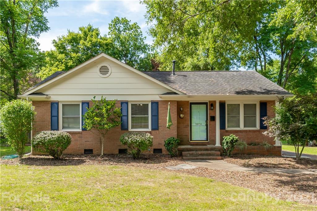 3854 Litchfield Road Charlotte, NC 28211 - Photo 32 of 35 a front view of a house with a yard