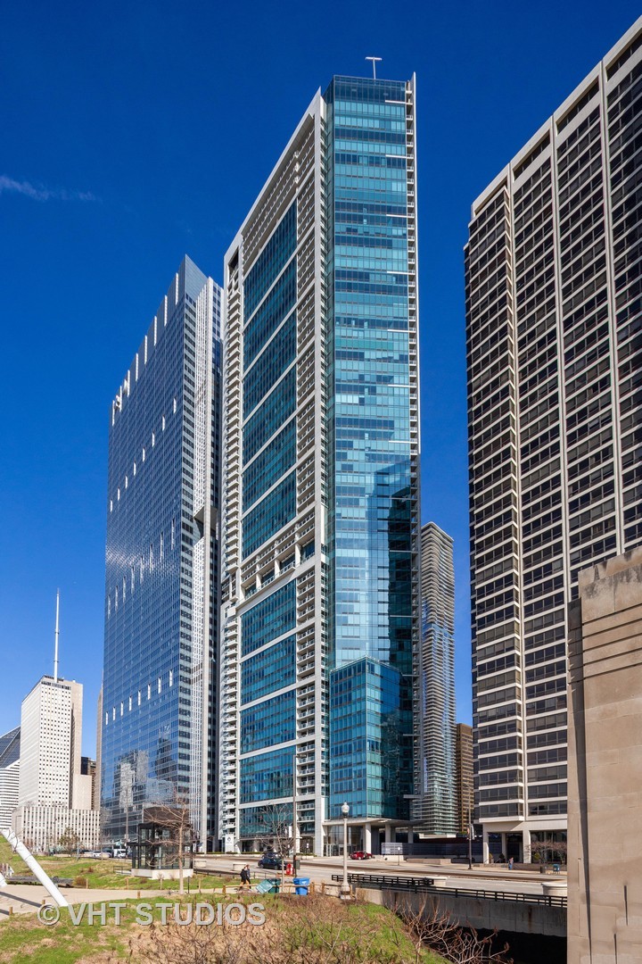 340 East Randolph Street, Unit 905 Chicago, IL 60601 - Photo 1 of 31 a front view of a building with street view