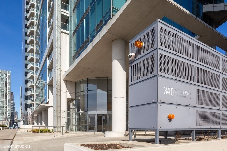 340 East Randolph Street, Unit 905 Chicago, IL 60601 - Photo 2 of 31 a front view of a building with street