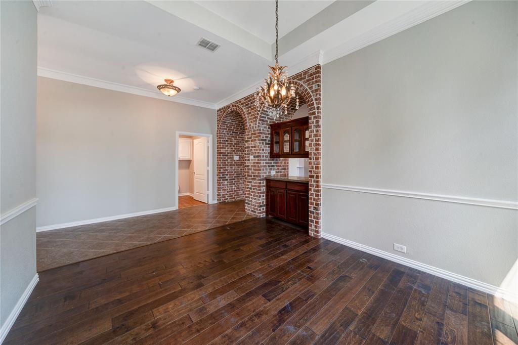 3418 Oakleigh Lane Frisco, TX 75033 - Photo 14 of 37 a view of a room with window and wooden floor
