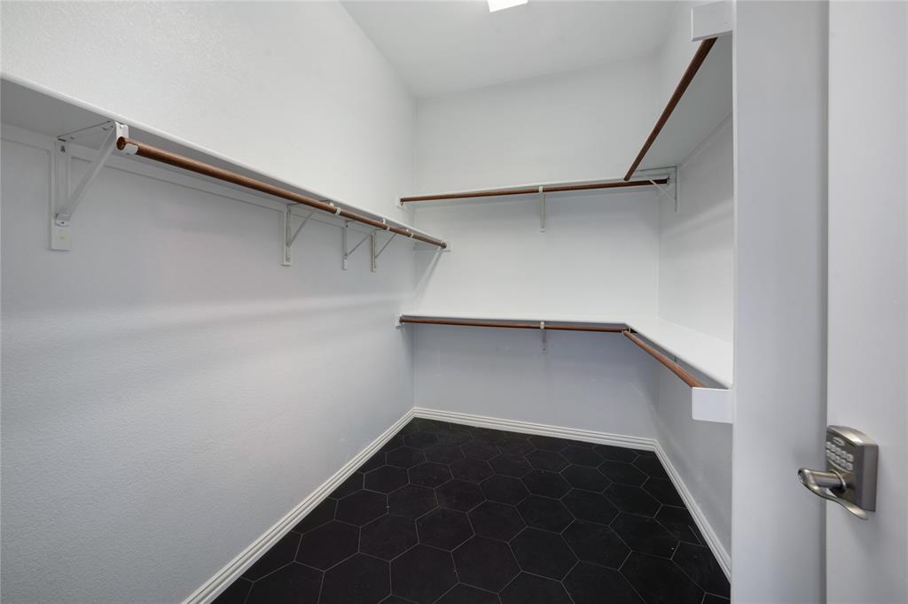 3418 Oakleigh Lane Frisco, TX 75033 - Photo 29 of 37 a view of walk in closet with empty racks
