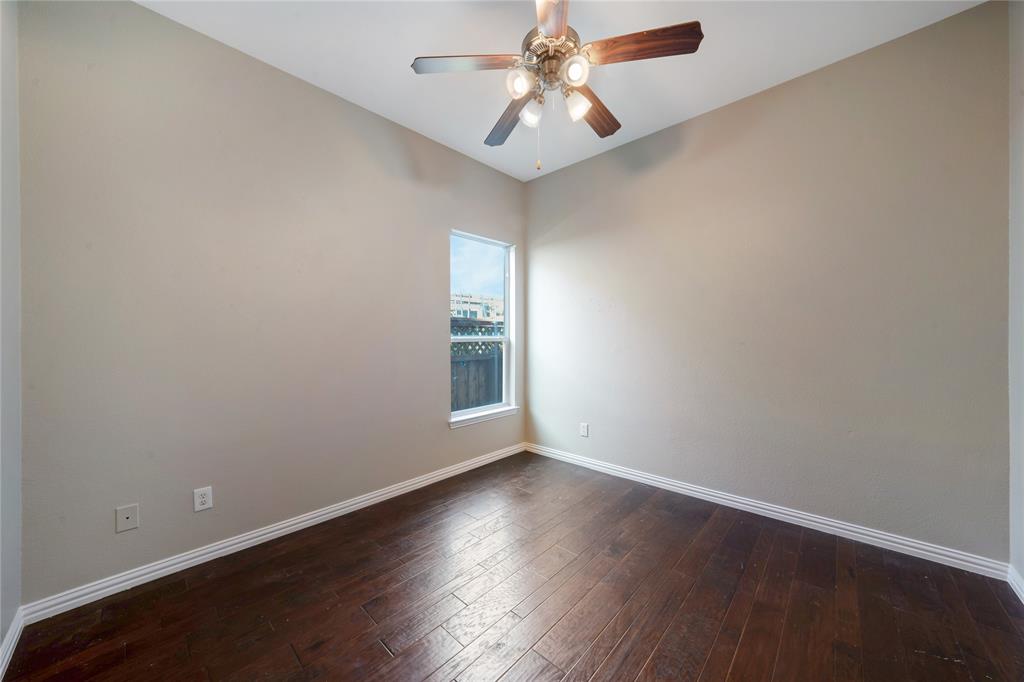 3418 Oakleigh Lane Frisco, TX 75033 - Photo 30 of 37 an empty room with wooden floor and windows
