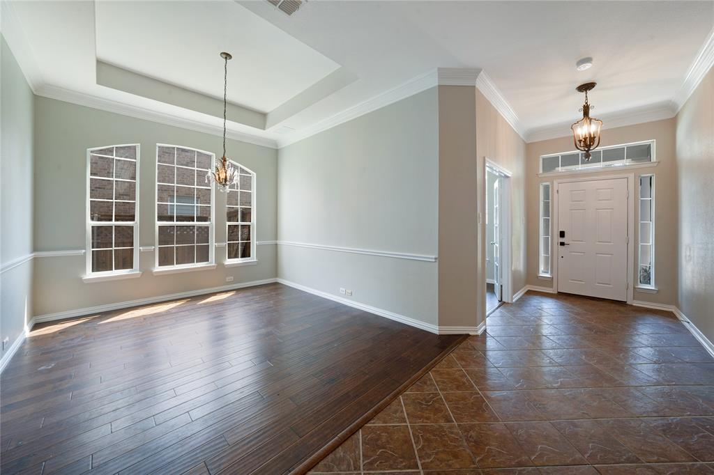 3418 Oakleigh Lane Frisco, TX 75033 - Photo 9 of 37 an empty room with wooden floor and window