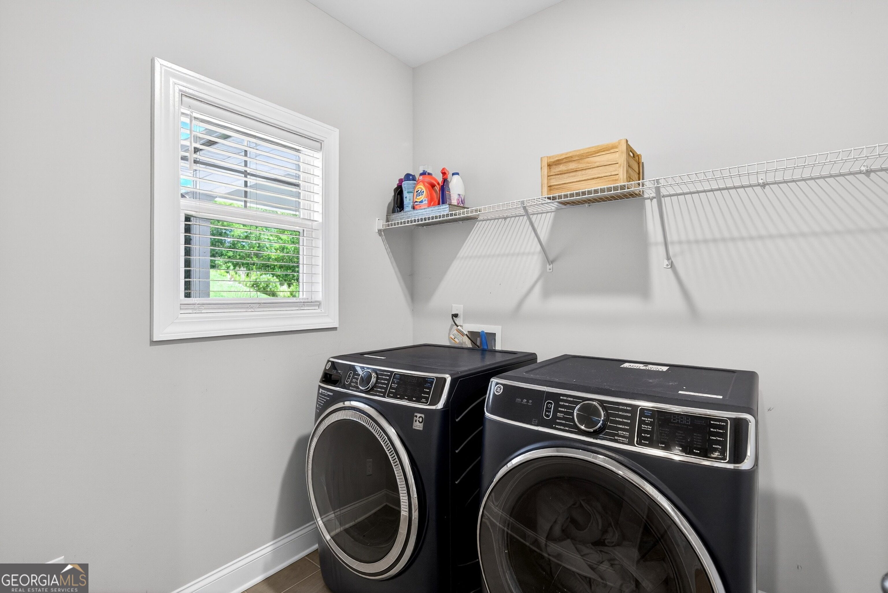 1764 Luther Bailey Road Senoia, GA 30276 - Photo 33 of 63 a utility room with dryer and washer