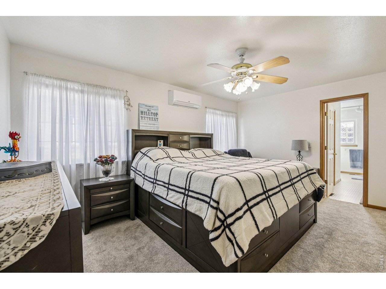 302 Victoria Street Berthoud, CO 80513 - Photo 13 of 25 Main Floor Primary Bedroom