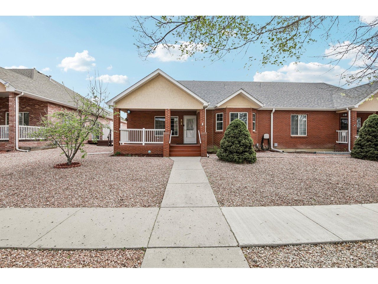 302 Victoria Street Berthoud, CO 80513 - Photo 2 of 25 Charming Brick 3-Bedroom Home