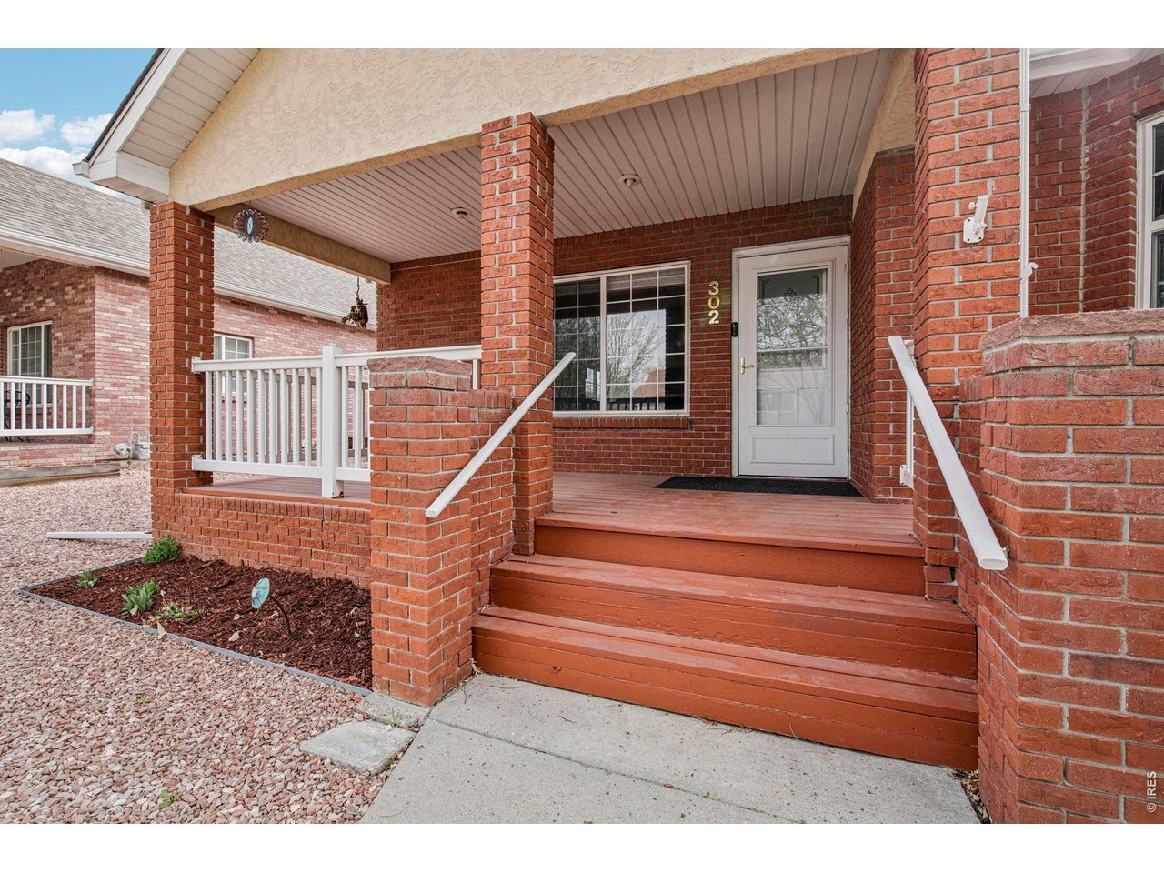 302 Victoria Street Berthoud, CO 80513 - Photo 3 of 25 Inviting Front Porch