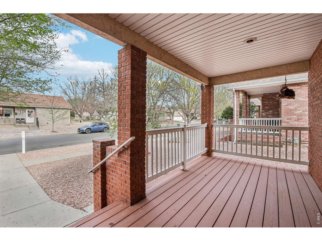 302 Victoria Street Berthoud, CO 80513 - Photo 4 of 25 Enjoy Morning Coffee on Your Covered Porch!