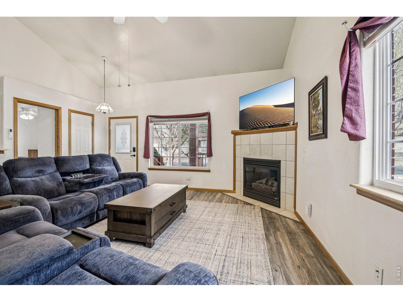 302 Victoria Street Berthoud, CO 80513 - Photo 6 of 25 Cozy Fireplace
