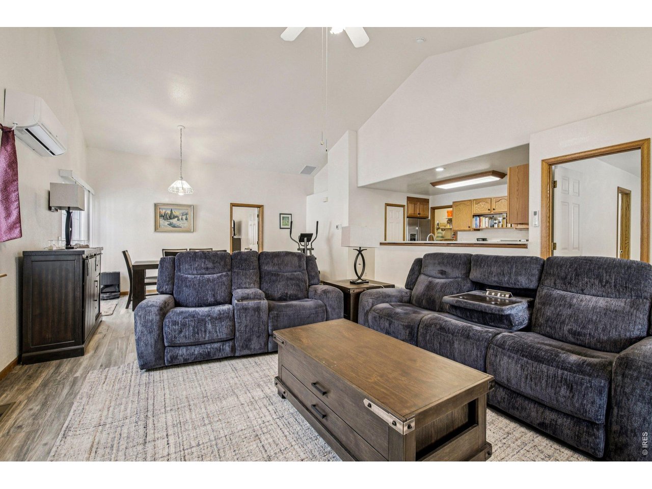 302 Victoria Street Berthoud, CO 80513 - Photo 7 of 25 Vaulted Ceiling & Luxury Vinyl Flooring