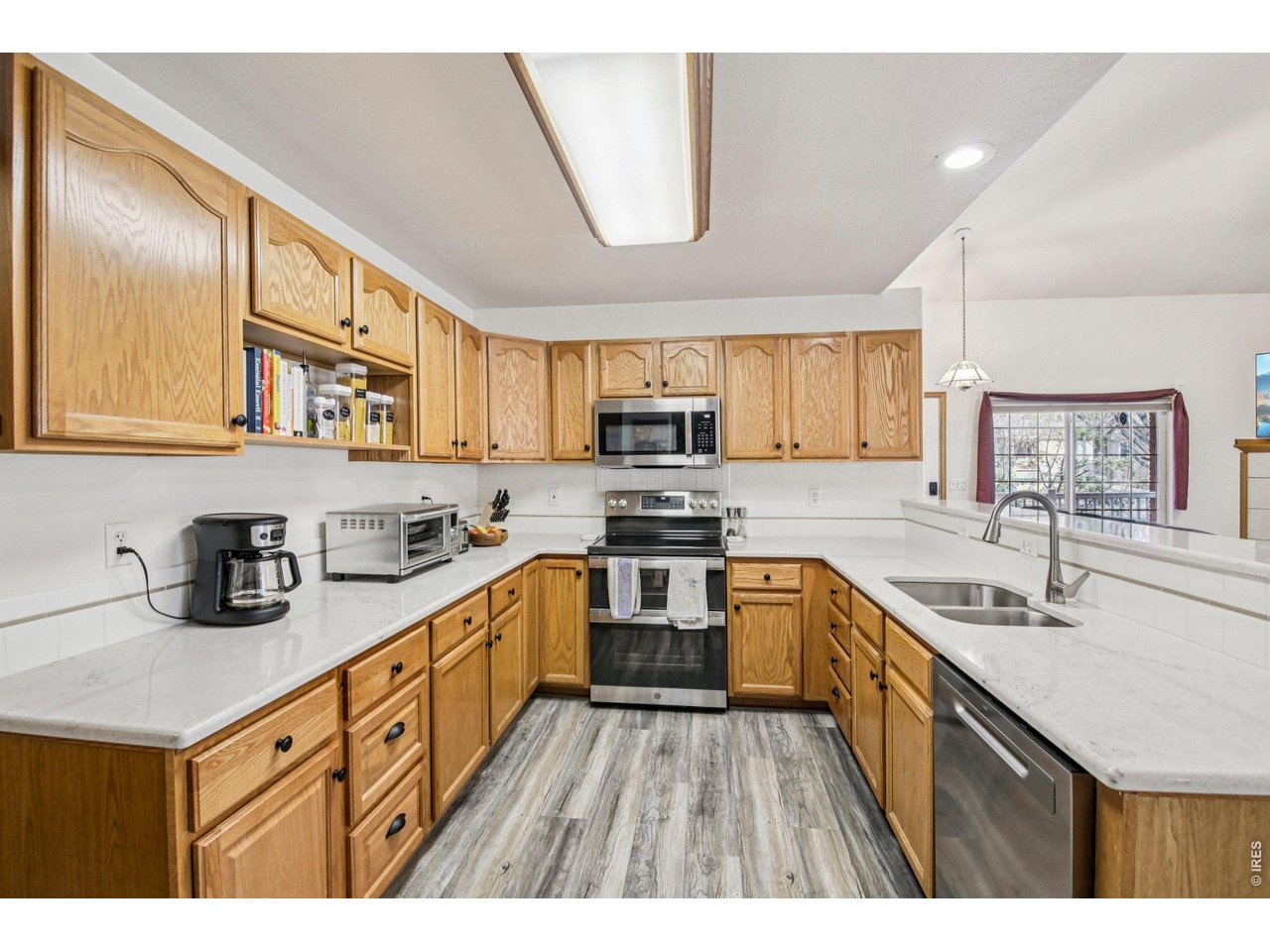 302 Victoria Street Berthoud, CO 80513 - Photo 9 of 25 Ample Cabinet & Counter Space