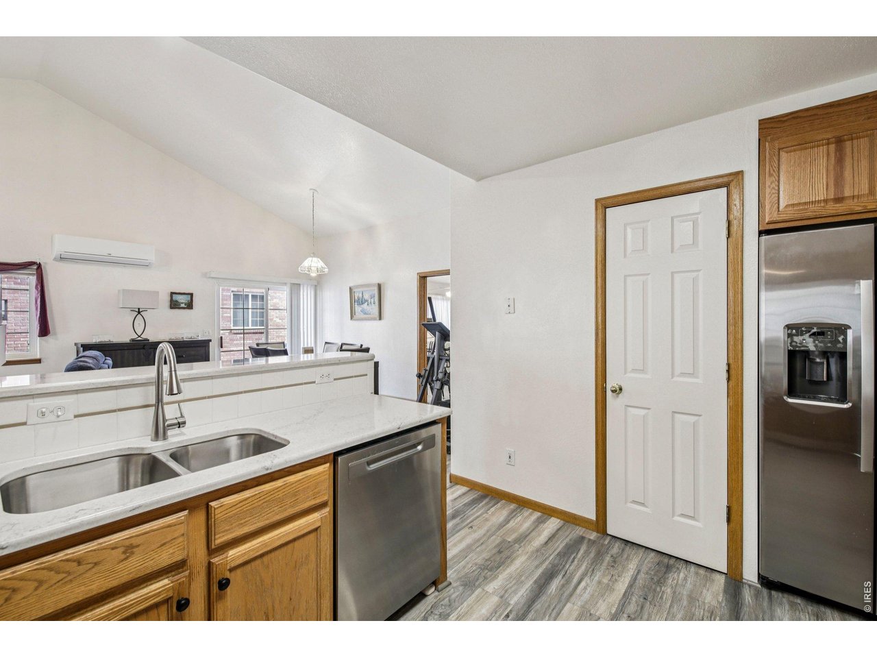 302 Victoria Street Berthoud, CO 80513 - Photo 10 of 25 Open to Living Room--Perfect for Gatherings