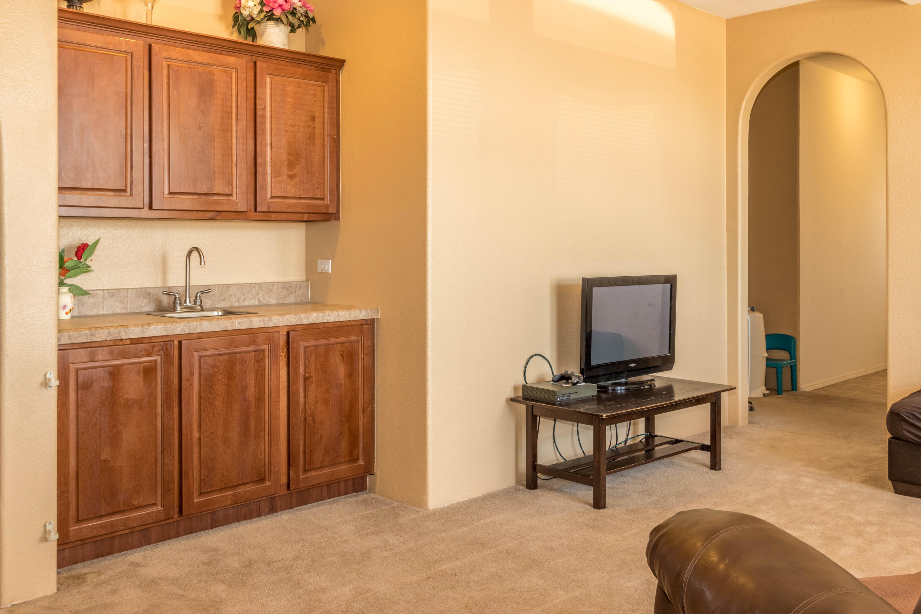 4403 Backus Road Mojave, CA 93501 - Photo 11 of 35 a view of a workspace with furniture and a window