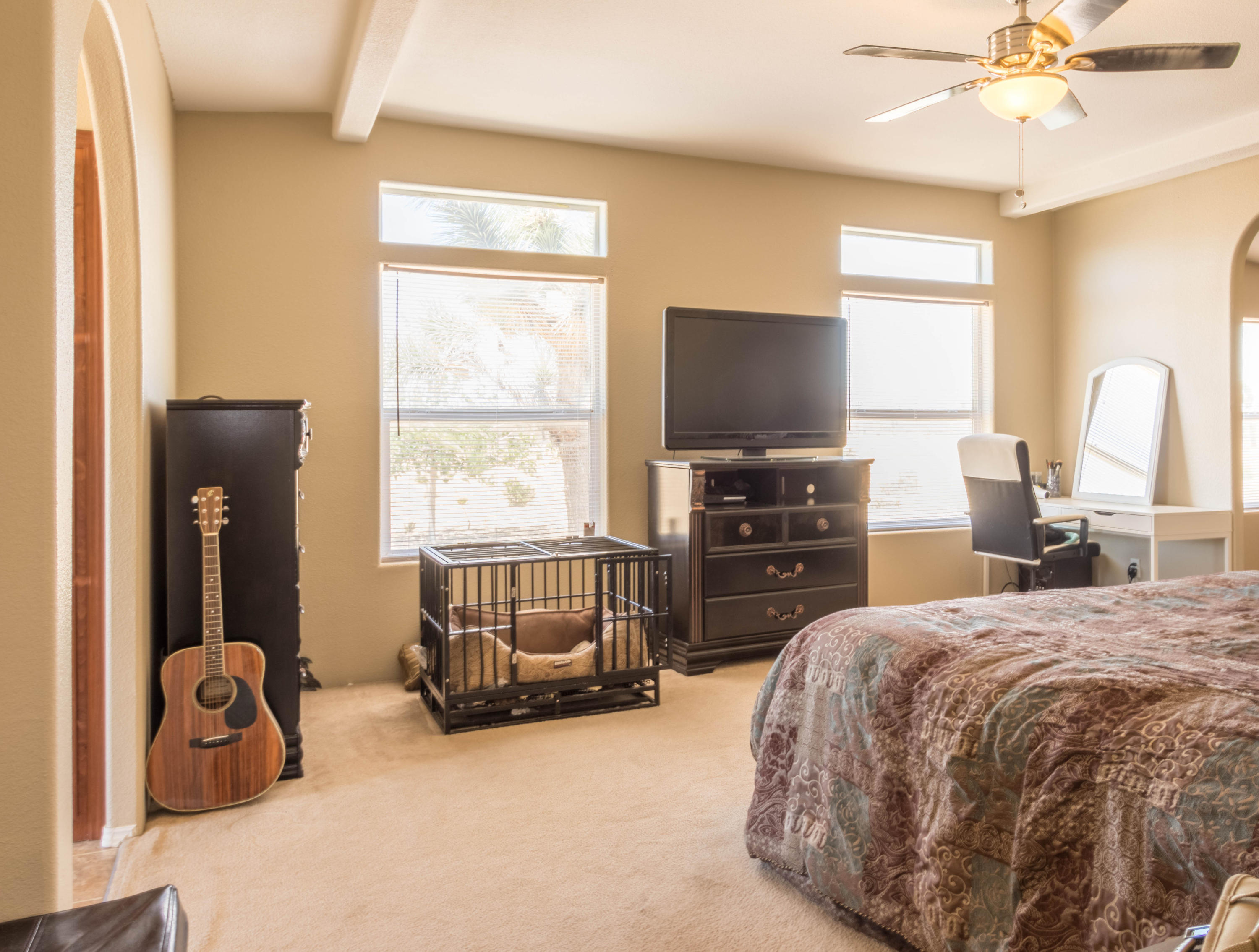 4403 Backus Road Mojave, CA 93501 - Photo 14 of 35 a bedroom with a bed and a television