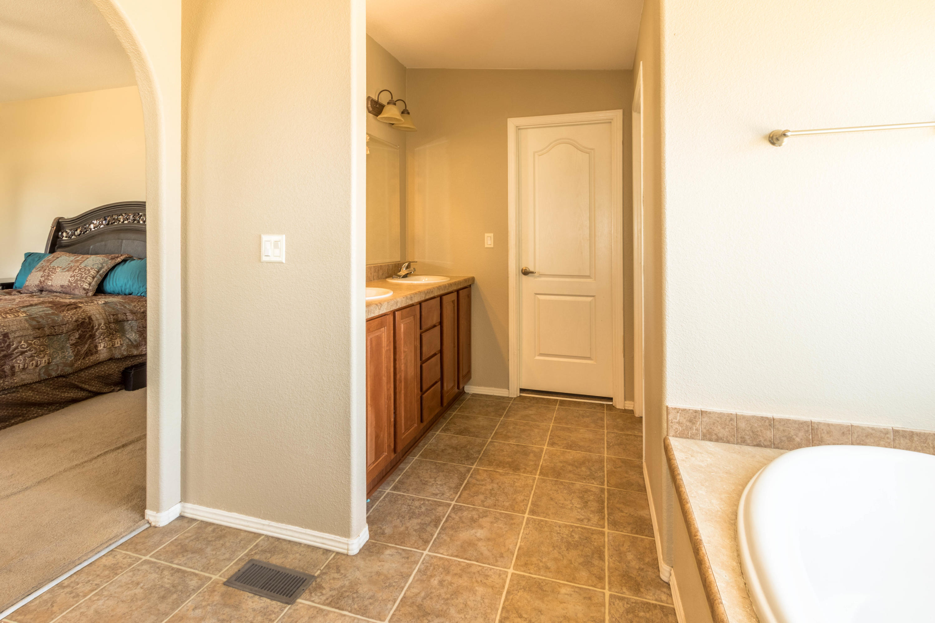 4403 Backus Road Mojave, CA 93501 - Photo 17 of 35 a view of a bedroom from a hallway