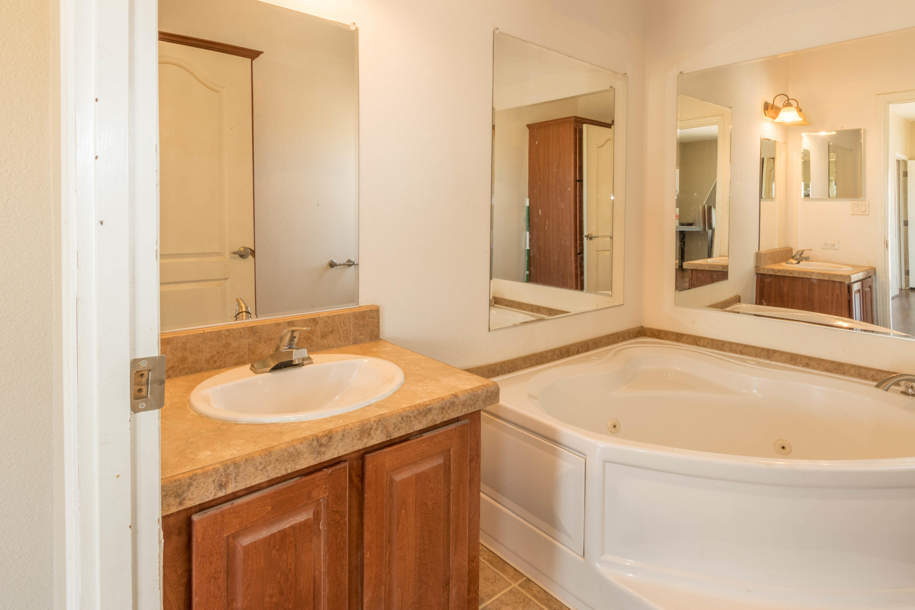 4403 Backus Road Mojave, CA 93501 - Photo 20 of 35 a bathroom with a sink and a bathtub