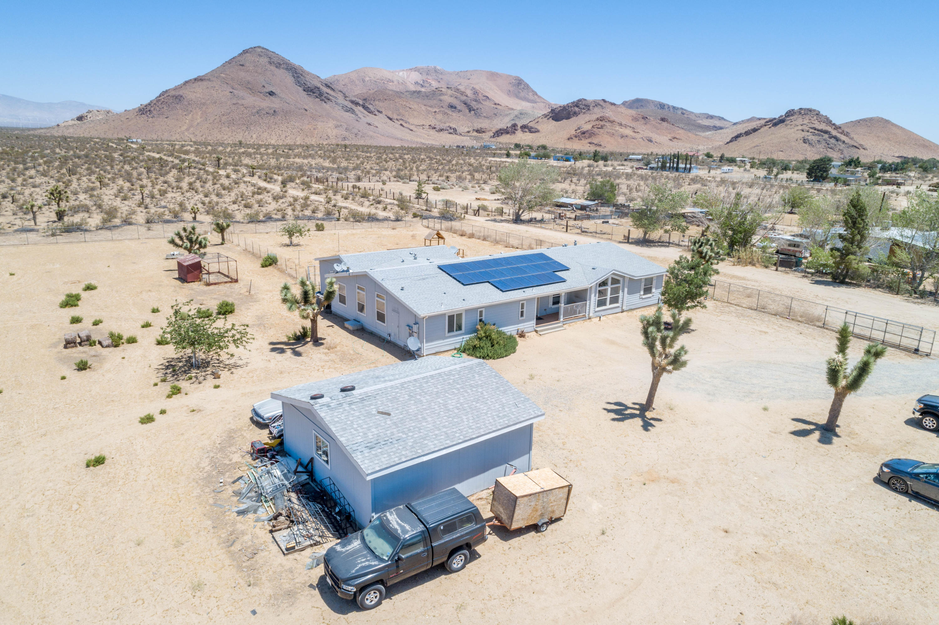 4403 Backus Road Mojave, CA 93501 - Photo 32 of 35 a view of a terrace with furniture and a mountain view