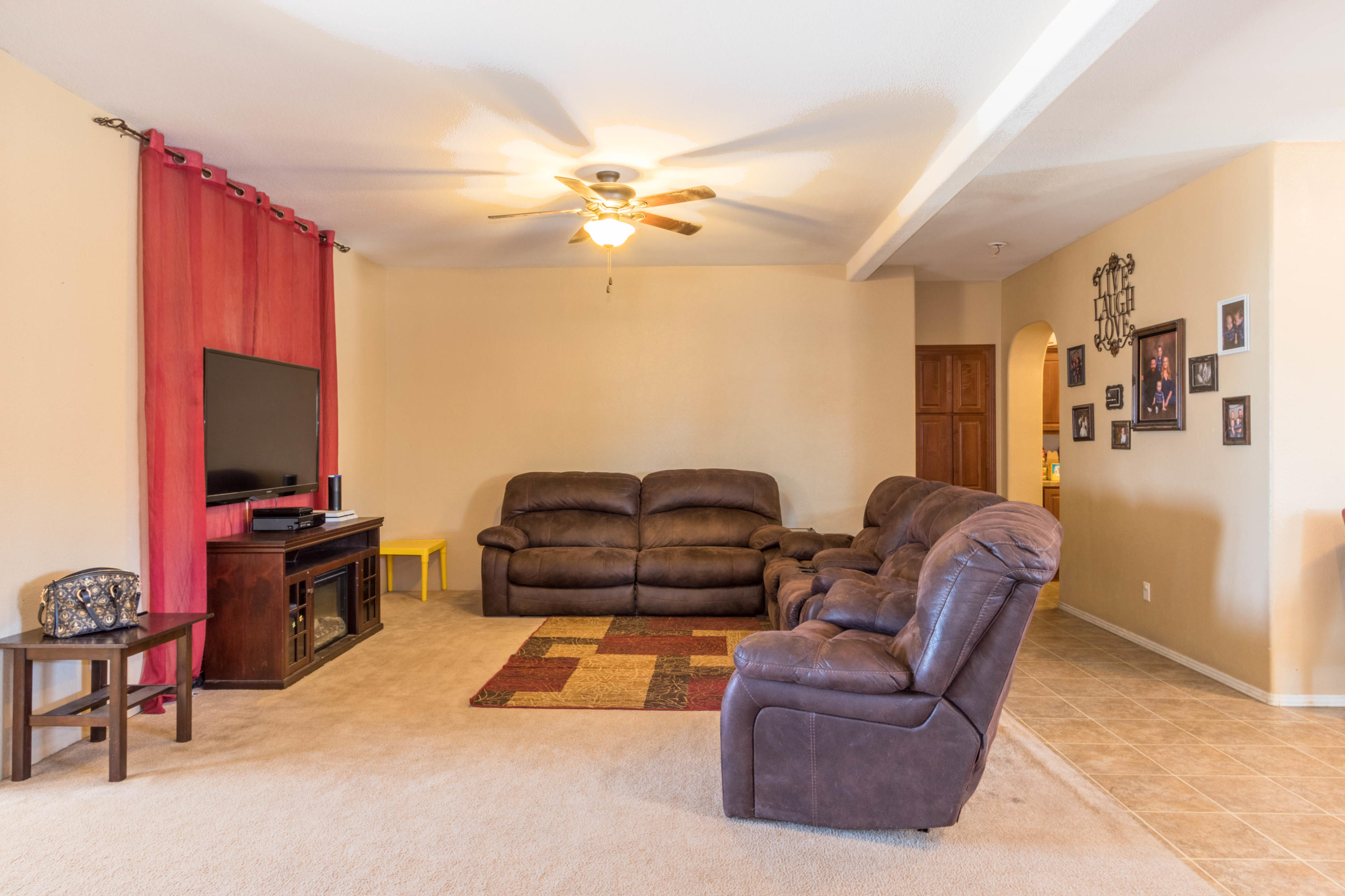 4403 Backus Road Mojave, CA 93501 - Photo 5 of 35 a living room with furniture and a flat screen tv