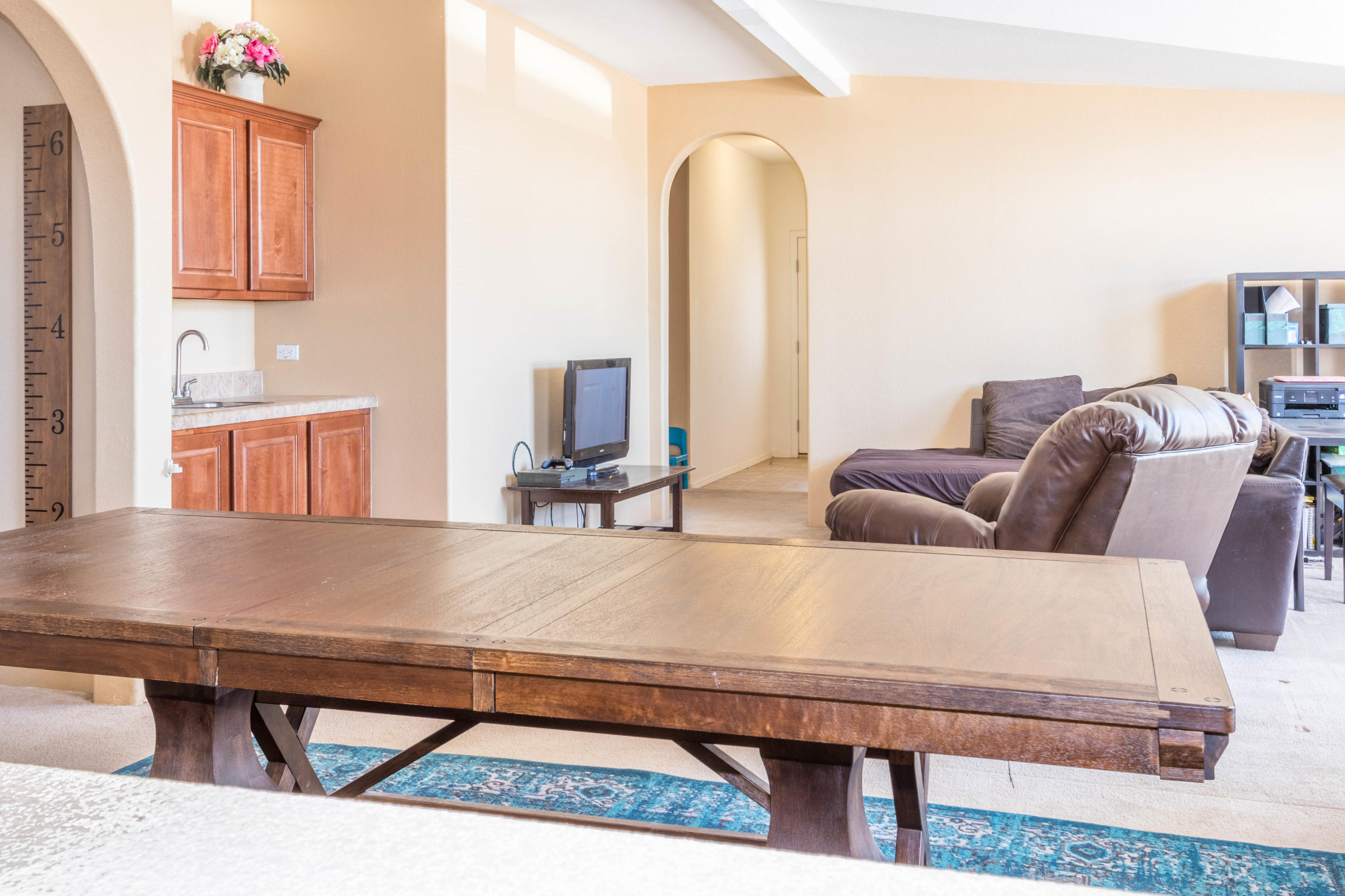 4403 Backus Road Mojave, CA 93501 - Photo 9 of 35 a living room with furniture and a table