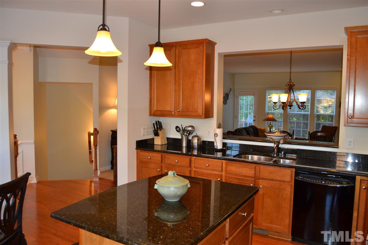 4725 Mifflin Street Raleigh, NC 27612 - Photo 7 of 25 Kitchen with oil rubbed bronze lighting.