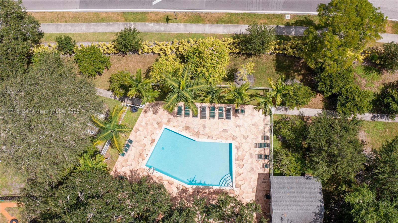 8325 Fairway Road Sunrise, FL 33351 - Photo 17 of 18 an aerial view of a house with a yard