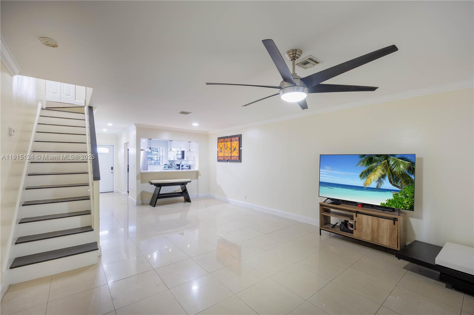 8325 Fairway Road Sunrise, FL 33351 - Photo 6 of 18 a living room with furniture and a flat screen tv