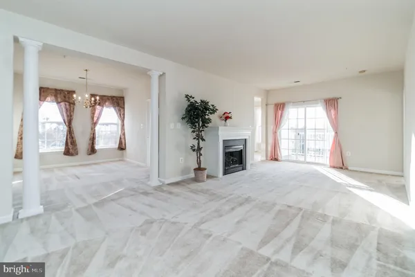 a view of a livingroom with a staircase
