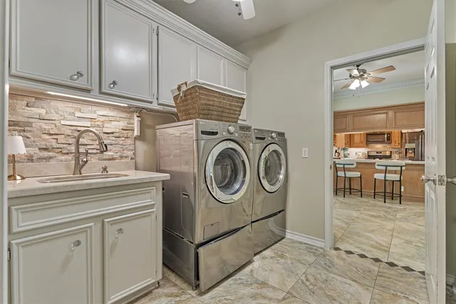a utility room with dryer and washer