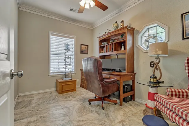 a bathroom with a toilet a sink a vanity and mirror