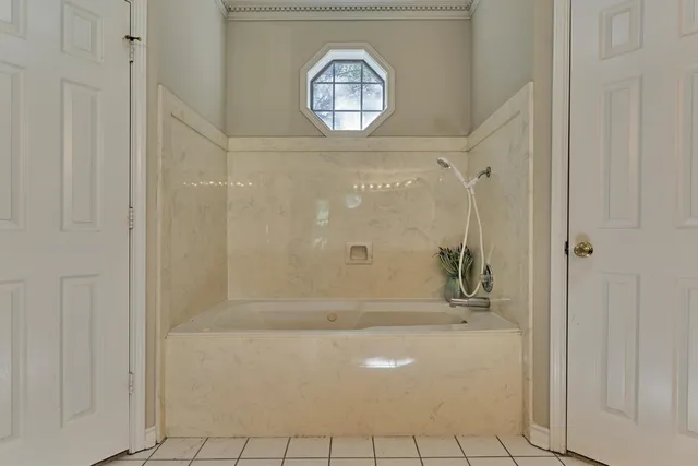 a bathroom with a sink double vanity and a mirror