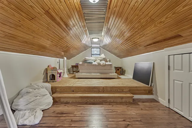 a view of spacious bedroom with a bed