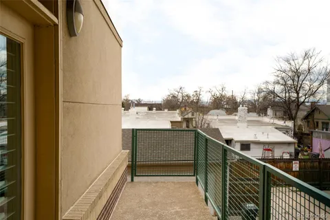 a view of a balcony with an outdoor space