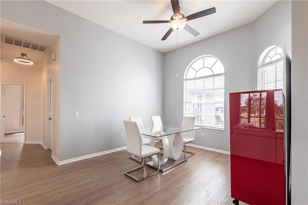 7306 Powder Puff Punta Gorda, FL 33955 - Photo 11 of 34 a view of a livingroom with furniture window and wooden floor