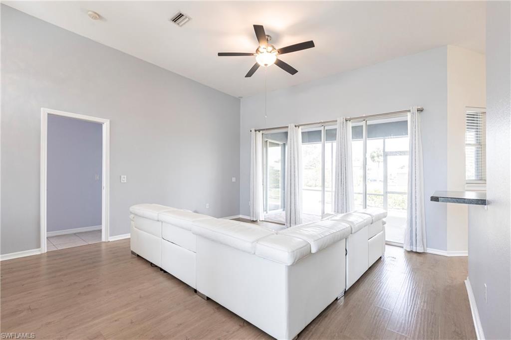 7306 Powder Puff Punta Gorda, FL 33955 - Photo 2 of 34 a living room with a bed furniture and a window