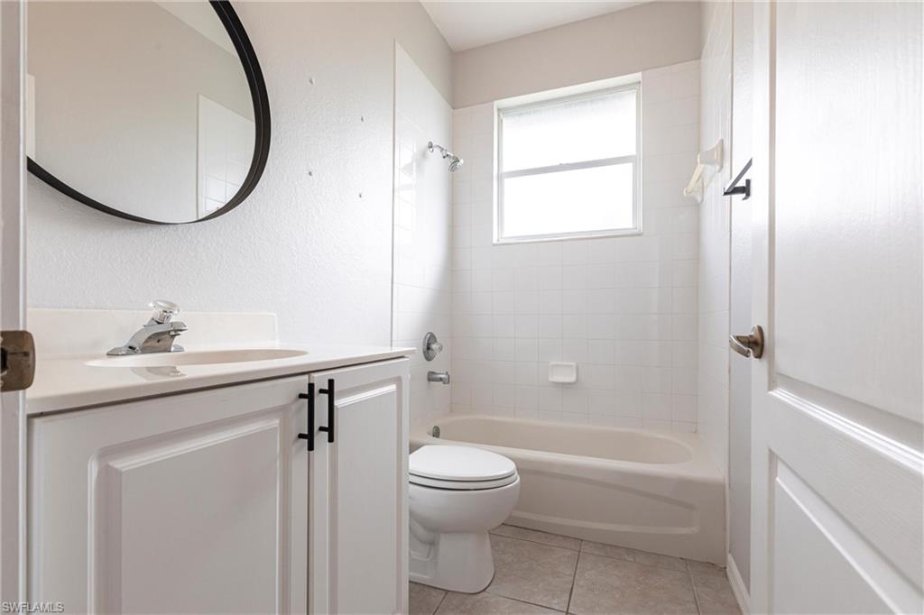 7306 Powder Puff Punta Gorda, FL 33955 - Photo 25 of 34 a bathroom with a sink toilet and shower
