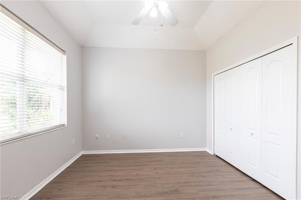 7306 Powder Puff Punta Gorda, FL 33955 - Photo 27 of 34 an empty room with wooden floor and windows