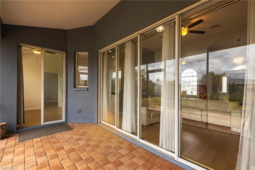 7306 Powder Puff Punta Gorda, FL 33955 - Photo 31 of 34 a view of a bathroom with a glass door