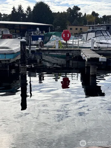 a bedroom with a bed and a mirror