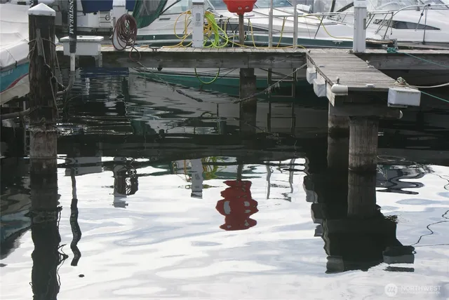 a front view of a house with sitting area
